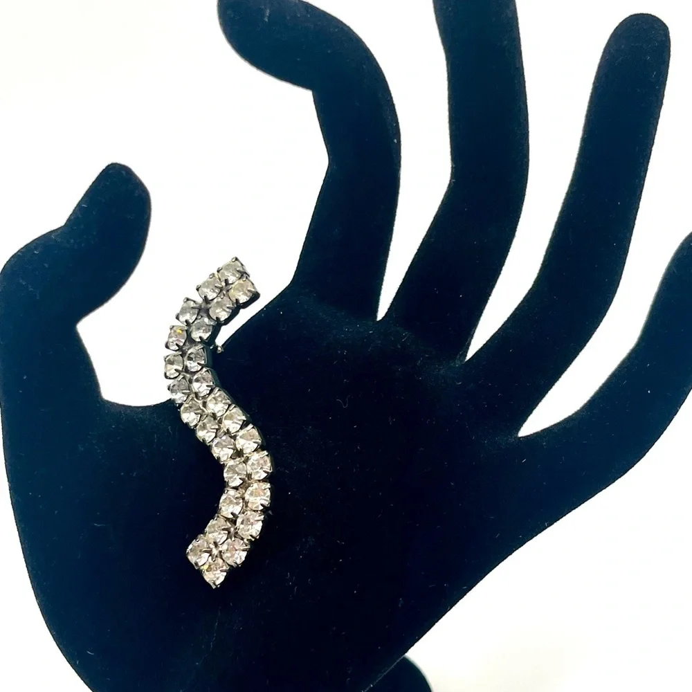 Vintage rhinestone wave brooch silver tone mid century